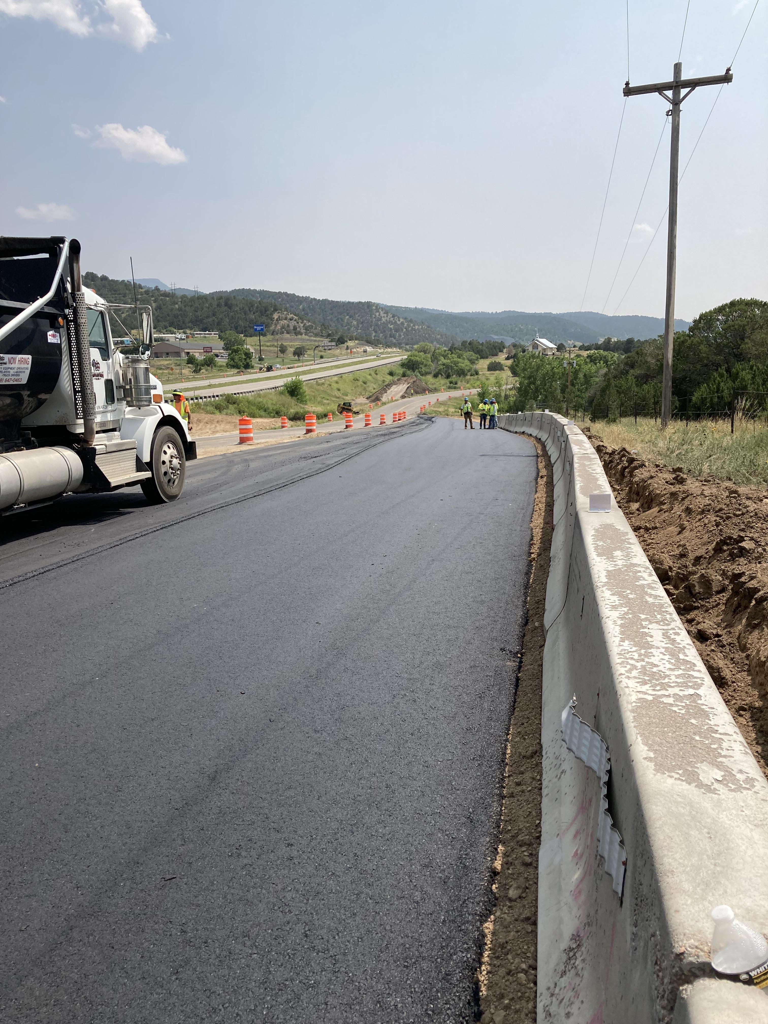 new safety barrier in place on detour pavement.JPG detail image