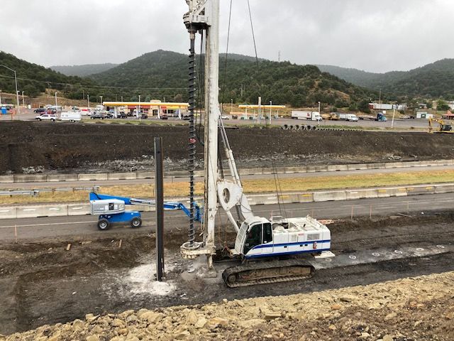 wide view of pre drilling h pile in progress.jpg detail image