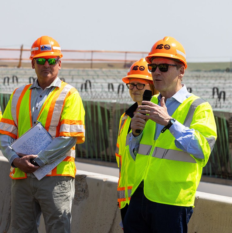 Sen. Bennet joins CDOT Executive Director Lew and the project team to mark the half-way point of the I-25 Greenland Wildlife Overpass construction. Sen. Bennet joins CDOT Executive Director Lew and the project team to mark the half-way point of the I-25 Greenland Wildlife Overpass construction.