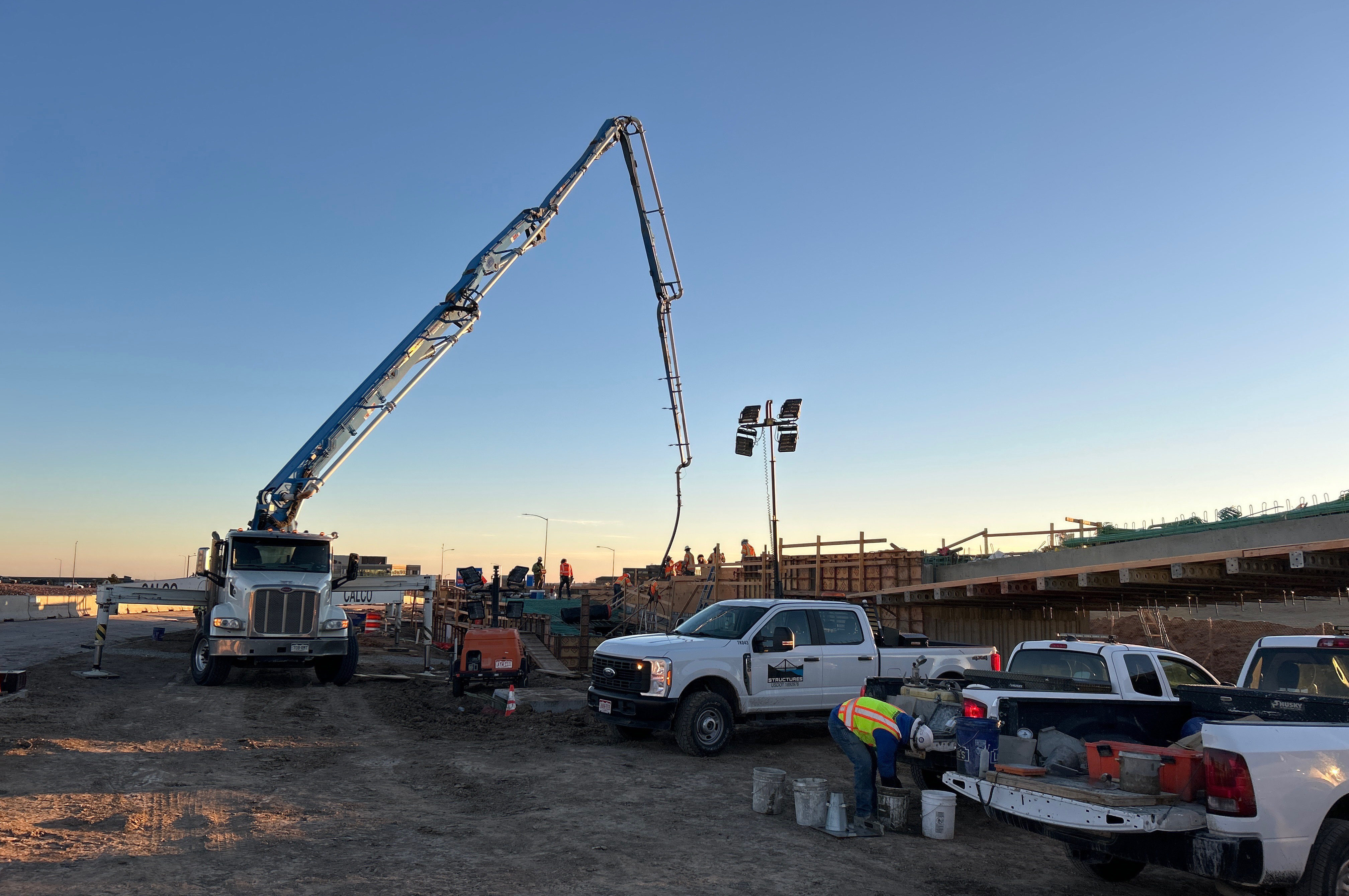 I-25 Lone Tree Mobility Hub Concrete rig pours onto pedestrian ramp.jpg detail image
