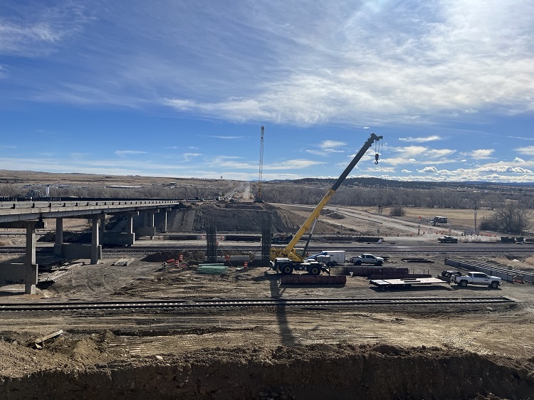 ResizedWide view drilling beams for new southbound I-25 bridge superstructure.jpg detail image