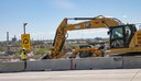 I-270 & US 36 Bridge Preventative Maintenance Excavator removing concrete rubble behind jersey barrier - April 2026.jpg thumbnail image