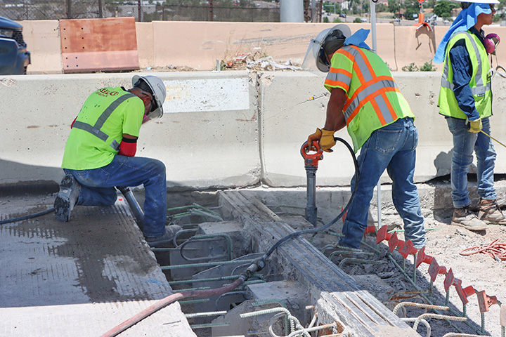 I-270 & US 36 Bridge Preventative Maintenance workers removing old concrete from bridge expansion joints.jpg detail image