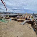 Crews finishing abutments and pier caps prior to girder placement photo Nick Bruce.jpg thumbnail image