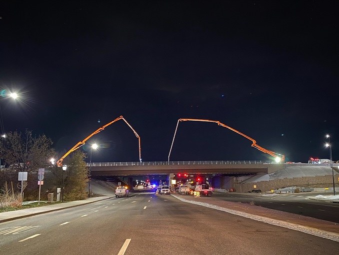 Wide view of new westbound I-70 bridge over 32nd Avenue during concrete deck pour. Photo Nick Bruce