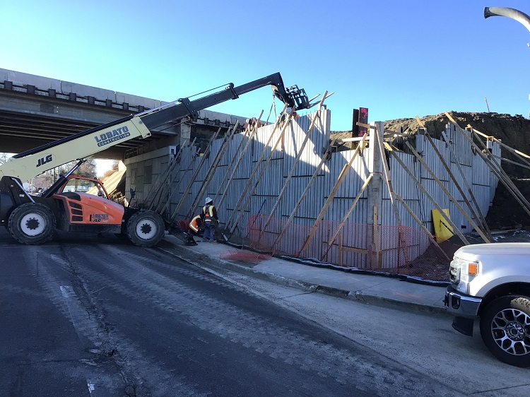 Crews installing MSE wall panels I-70 over Ward Road bridge.jpg detail image