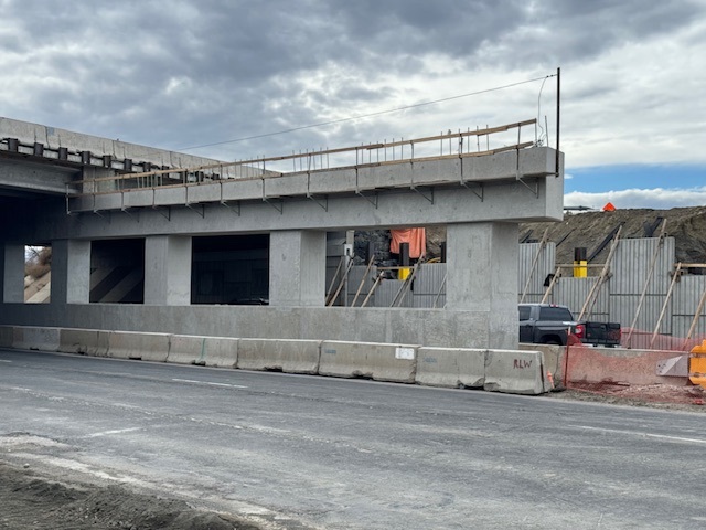 Closeup pier cap and MSE wall under construction I-70 Ward Rd Estate Media.jpg detail image