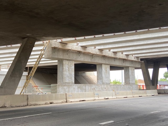 Closeup poured pier cap with placed girders I-70 over Ward Rd Photo Estate Media (1).jpg detail image