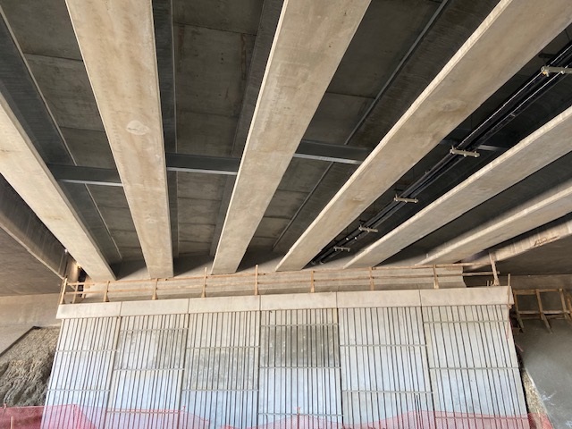 Closeup underside new bridge structure I-70 Ward Rd Photo Estate Media.jpg detail image
