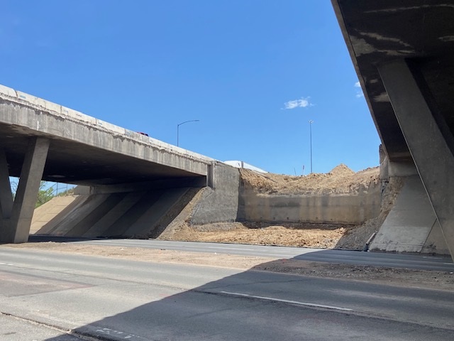 View of demolished overhang and slope paving I-70 over Ward Road bridge structures.jpg detail image