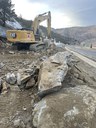 Construction equipment excavating rocks. thumbnail image