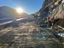 Construction crews installing rebar