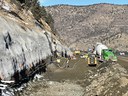 Crews spraying shotcrete on mountain wall. thumbnail image