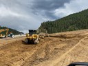 Three pieces of heavy equipment moving dirt for the water quality pond. thumbnail image