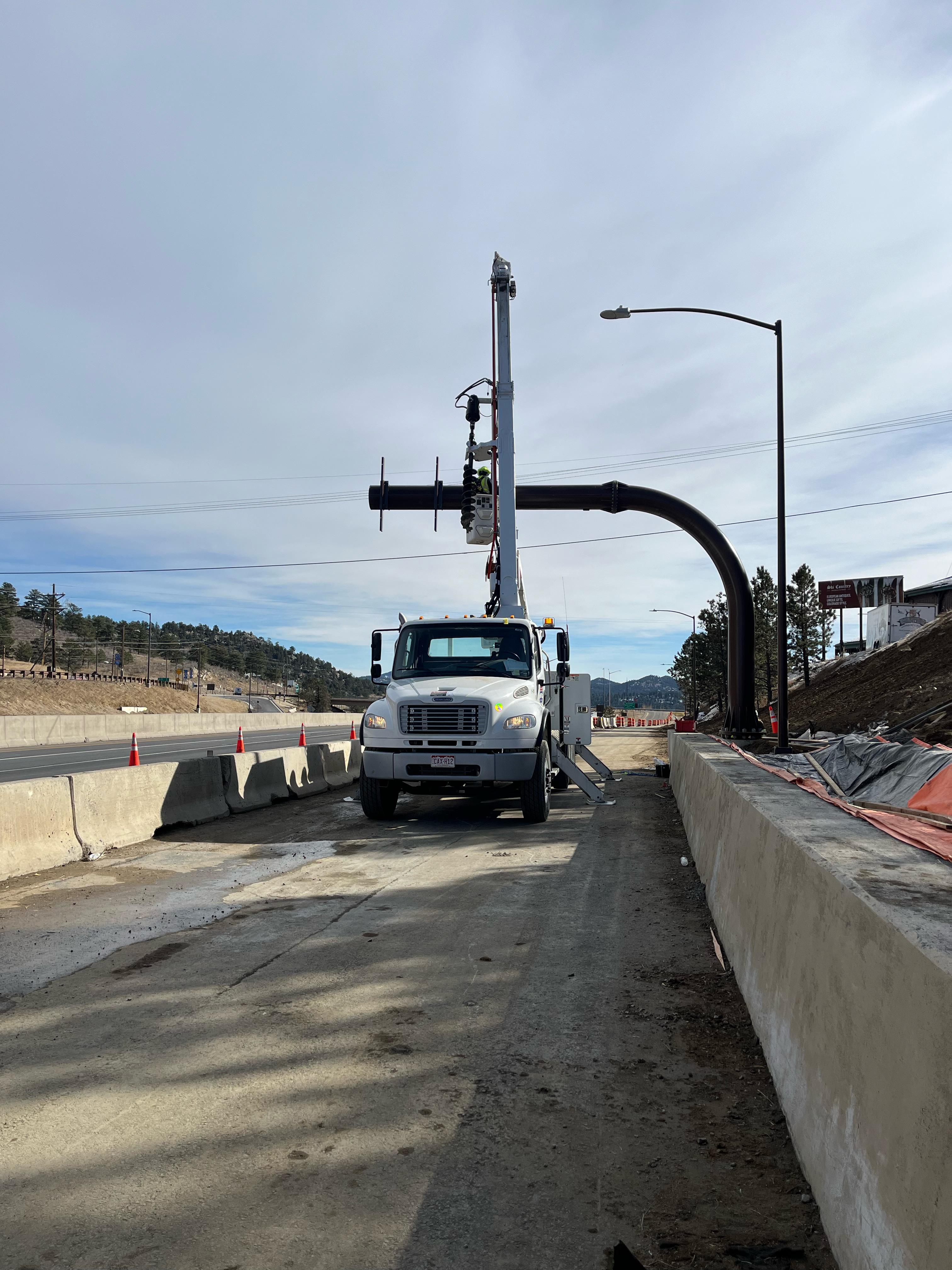 Crews installing signage I-70 Floyd Hill Project — Colorado Department ...