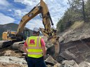 Construction equipment breaking rock thumbnail image