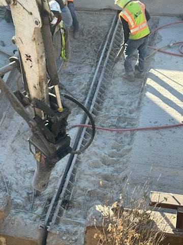 Project teams work on a bridge joint as part of the I-70 Glenwood Canyon Bridge Joint Improvement Project in Glenwood Canyon.