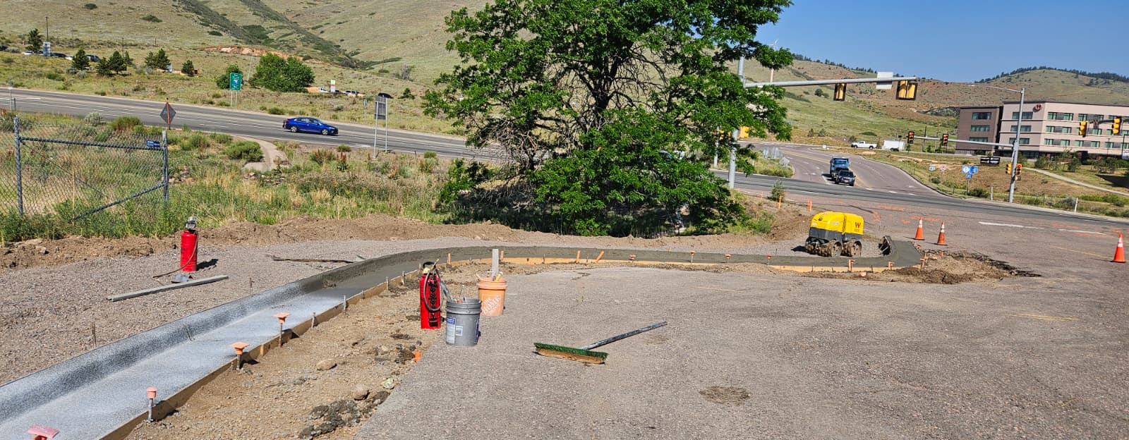 I-70 Geological Hogback Trail Rehabilitation new sidewalk, curb and gutter at TREX parking lot.jpeg detail image