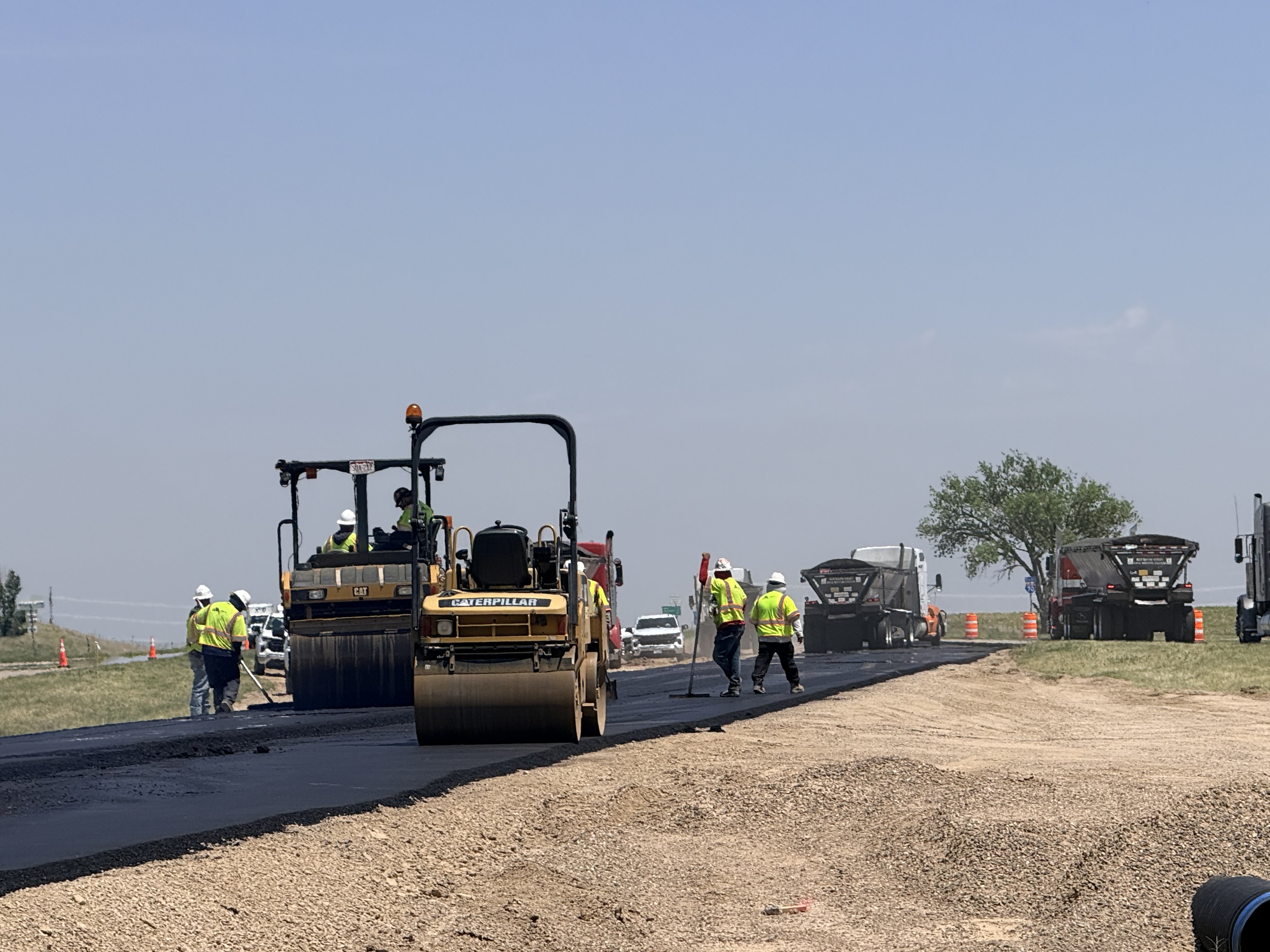 I-70 Seibert-Stratton Roadway Improvements_Crossover Paving Operations Switch and Crews Paving.jpeg detail image