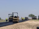 Paving asphalt crossovers for the westbound to eastbound traffic switch near Seibert. thumbnail image