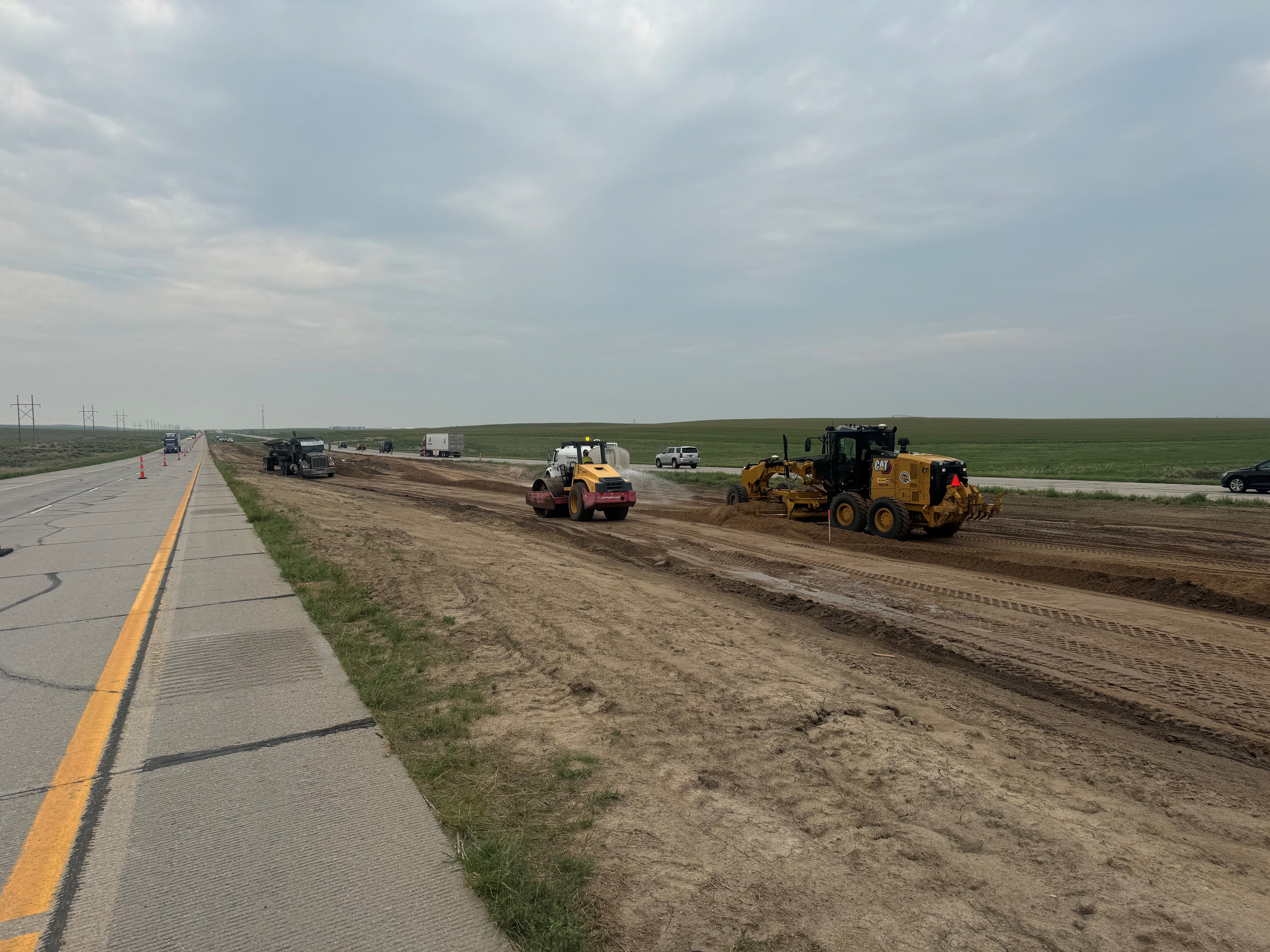 I-76 Corridor Improvements Earthwork compaction during early stages of building the median crossover roadway.jpg detail image