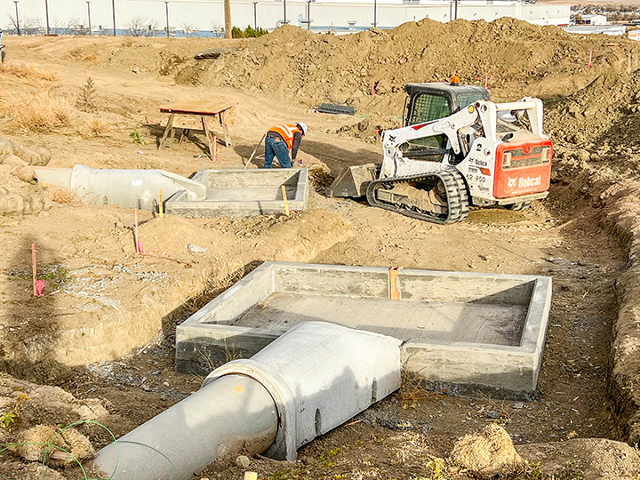 Charter Oak Ranch Road Retention pond drainage pipes.jpg detail image