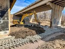 S Academy Bridge_Fountain Creek_excavator covering Ajacks.jpg thumbnail image