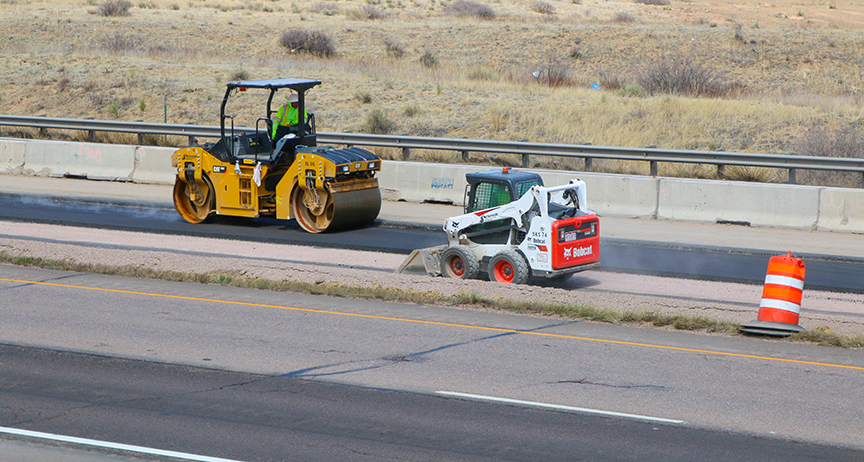 I-25 paving roller and skid steer_sm.jpg detail image