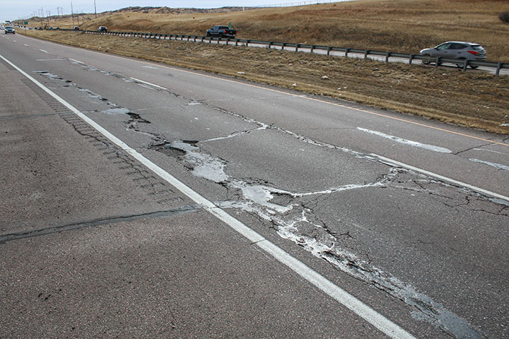 Significant stretch of road damage detail image