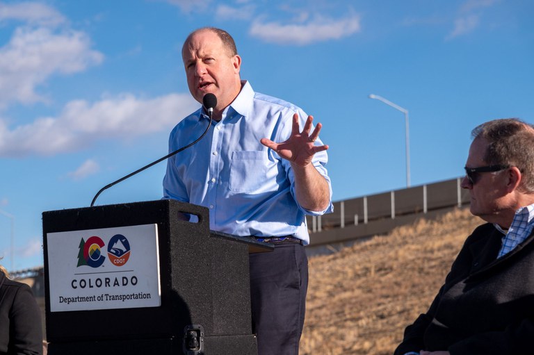 Governor Polis giving remarks at the North I-25 ribbon cutting