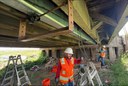 Timber Bridge Preservation Crews installing steel beam timber bridge Peyton.jpg thumbnail image