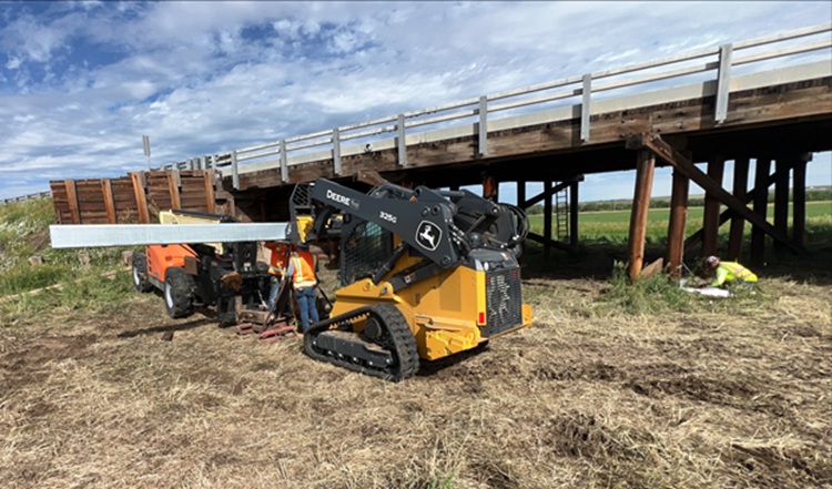 Timber Bridge Preservation wide view steel beam placement Peyton bridge.jpg detail image
