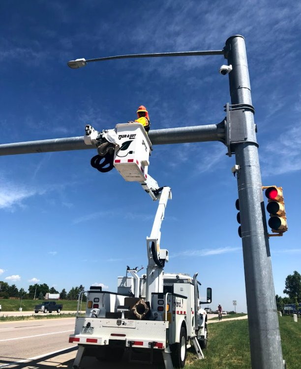 CDOT crews installing Snowplow Signal Priority Pilot Project technology along Wadsworth Boulevard