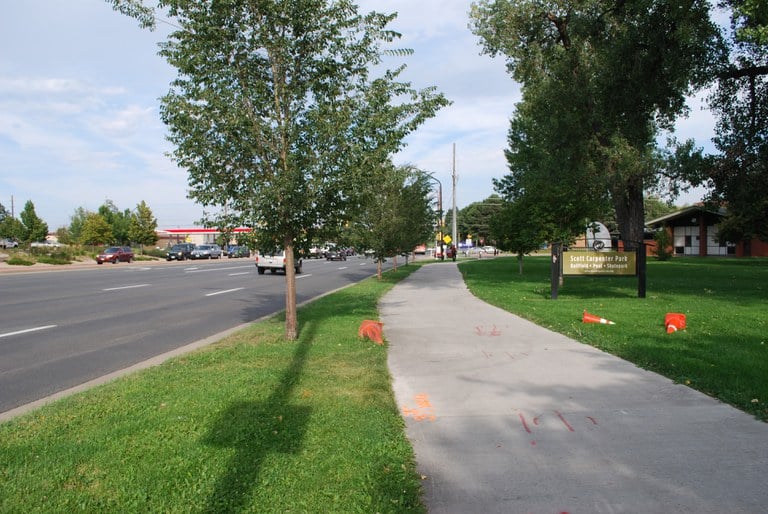 ALT Text: An image of a recreational path next to the road.