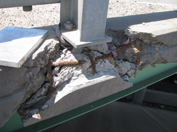 Bridge rail deterioration impacts overall structure safety and integrity at the WB I-270 over 60th Ave and BNSF spur Structure. detail image