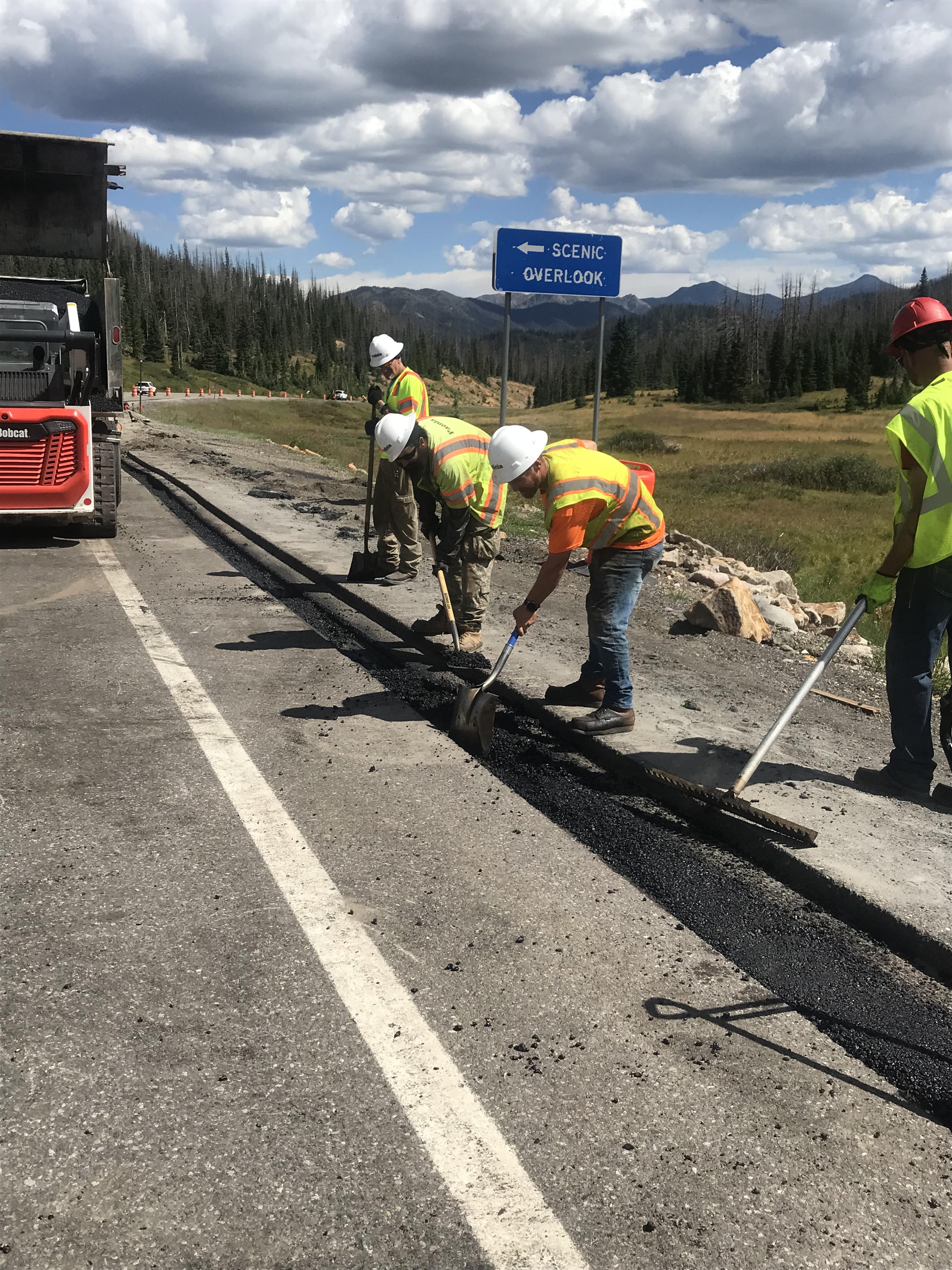 Crews on US 160 complete the fiber optic line installation with new asphalt. (photo by SEH) detail image