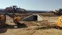 Heavy equipment backfilling the box culvert extension and grading where we are widening US 24 for close to a mile of eastbound passing lane east of Calhan thumbnail image