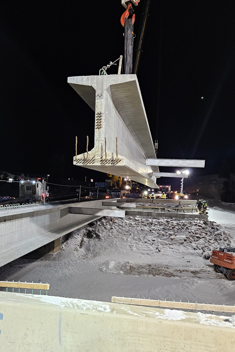 Closeup girder placement new US 285 bridge Fairplay Basis Partners.jpg detail image