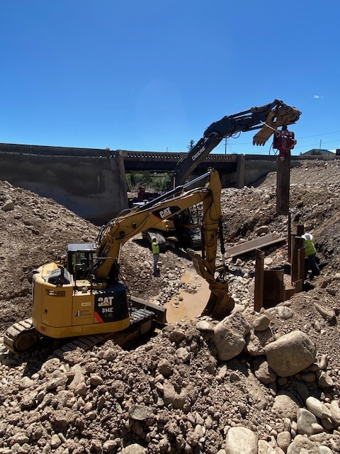 Crews reinforcing area for cantilever wall construction at bridge site US 285 Fairplay photo Estate Media.jpg detail image