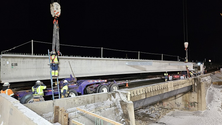 Resizedcrewsplacinggirders US285 Bridge Basis Partners.jpg detail image