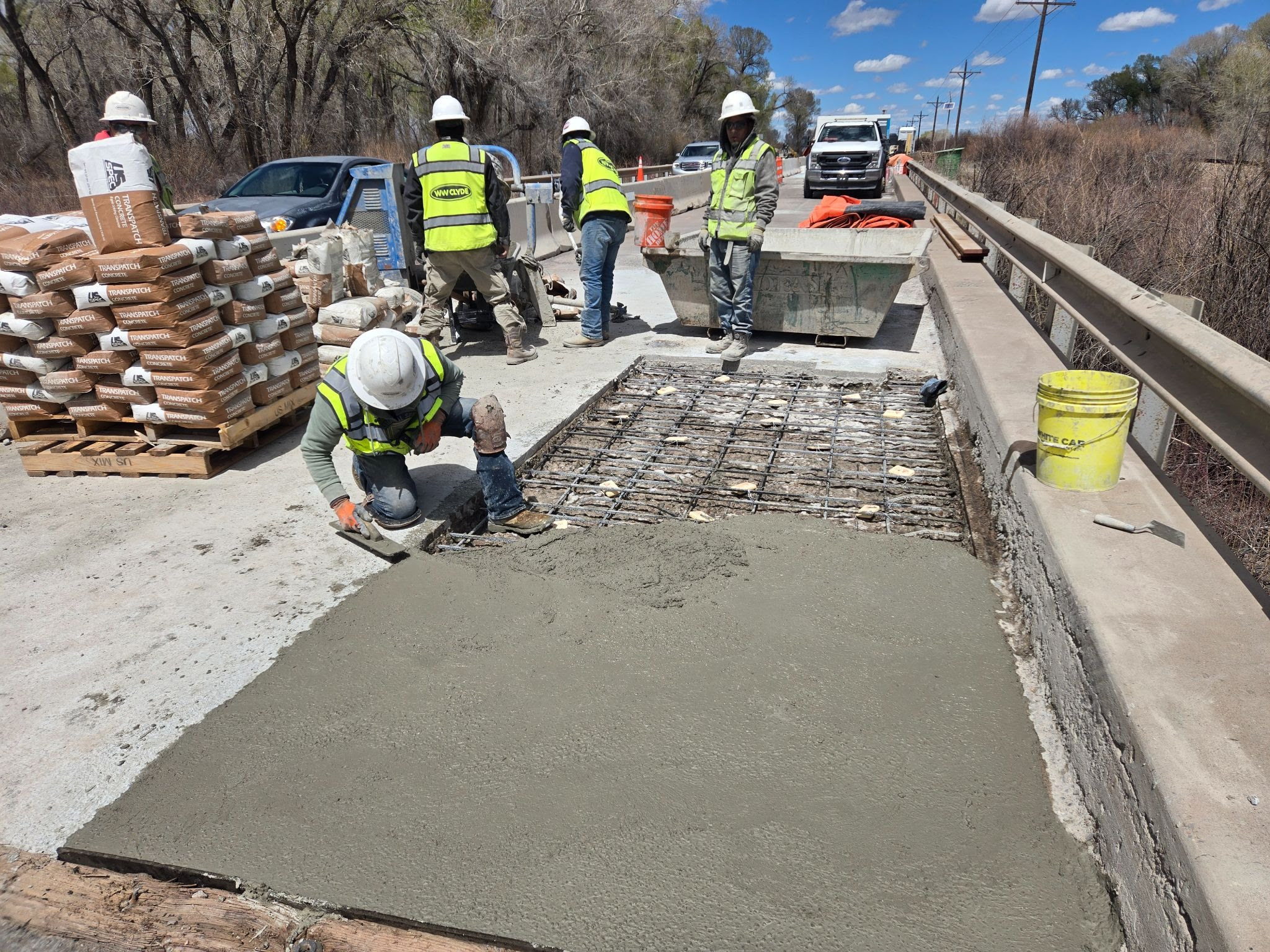 US 285 Bridge Improvements in Conejos County Crew placing concrete on bridge deck.jpg detail image