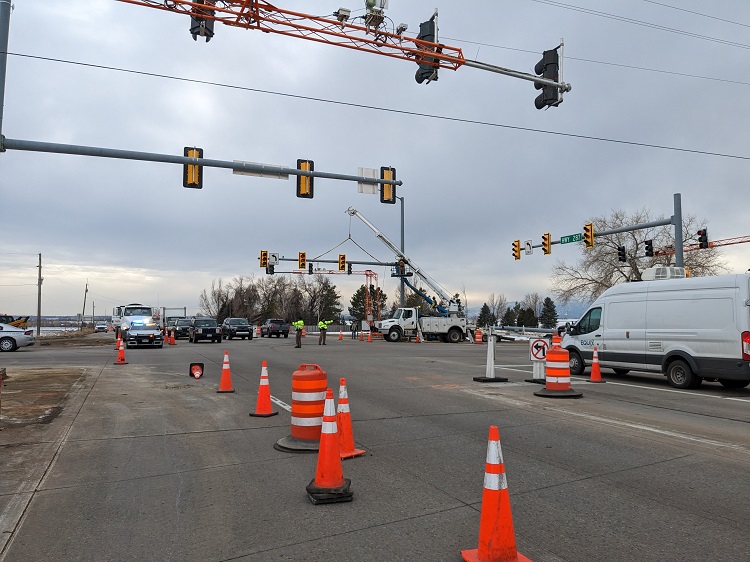 Crews removing mast arms at the intersection of US 287 and CO 52. Photo Tim Bricker. Crews removing mast arms at the intersection of US 287 and CO 52. Photo Tim Bricker.