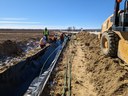 crews lining new irrigation ditch Tim Bricker.jpg thumbnail image