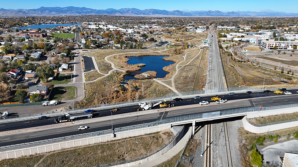 US 287 Resurfacing Daytime Paving over Railroad Bridge.jpg detail image