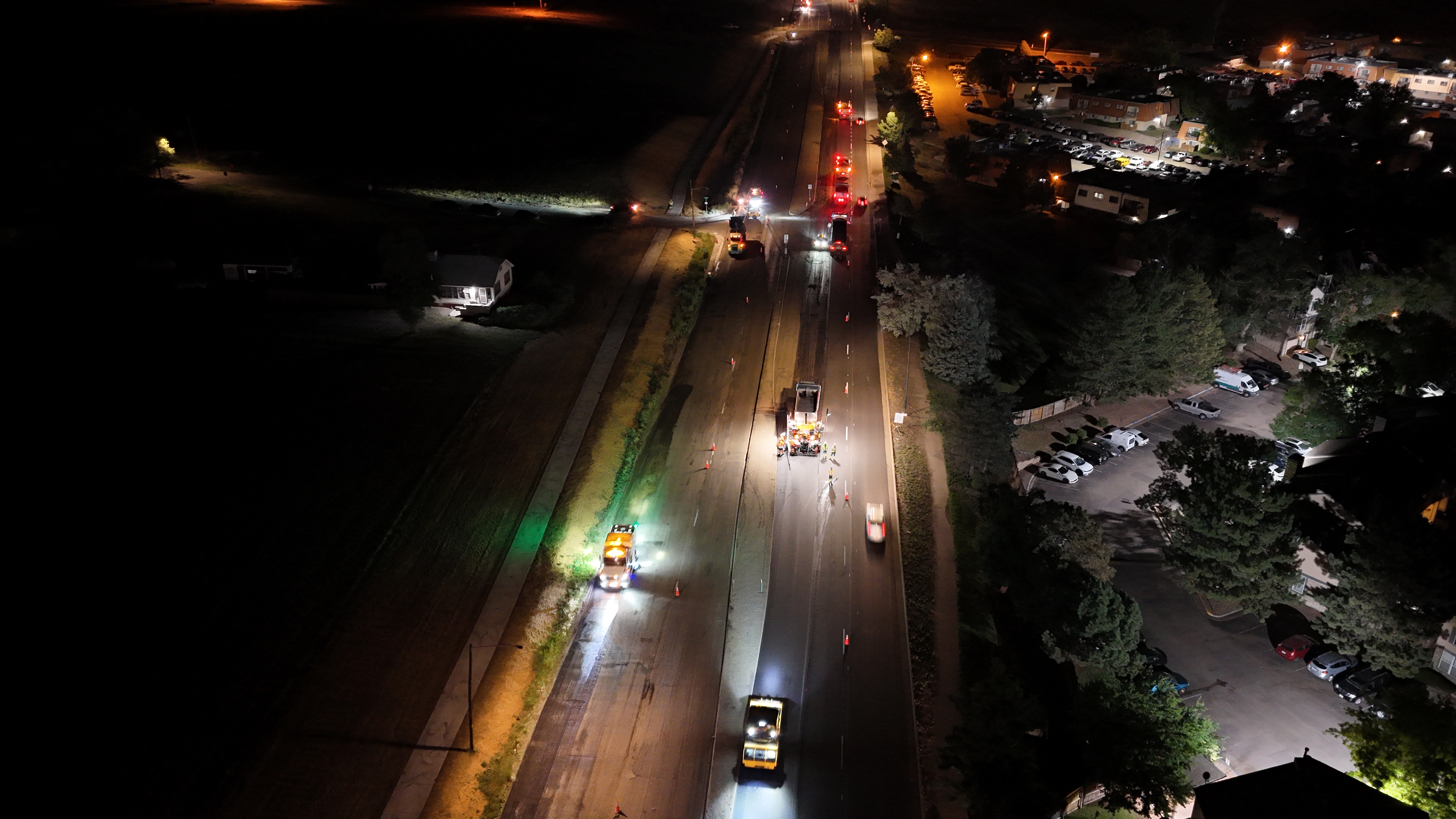 US 287 Resurfacing Pavers followed by rollers nighttime resurfacing.jpeg detail image