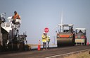 flaggers directing traffic during paving operations US 385.jpg thumbnail image