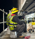 crews_place_bolts_to_hold_steel_plates.png thumbnail image