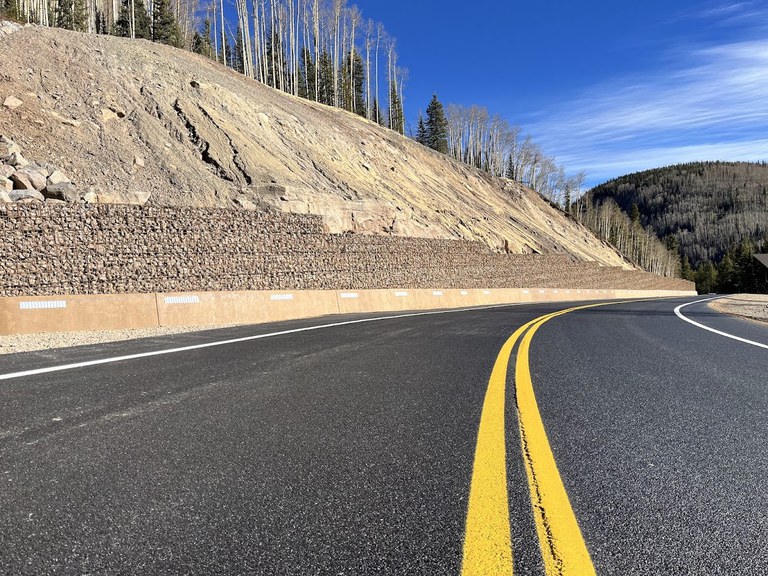 Completed slope work and rock retaining wall on US 550 at the Deer Creek location (MP 59.3)