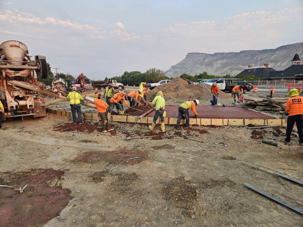 US 6 Palisade Intersection Improvements - US 6 at Elberta Avenue pouring the roundabout apron looking west_August2026.jpg detail image