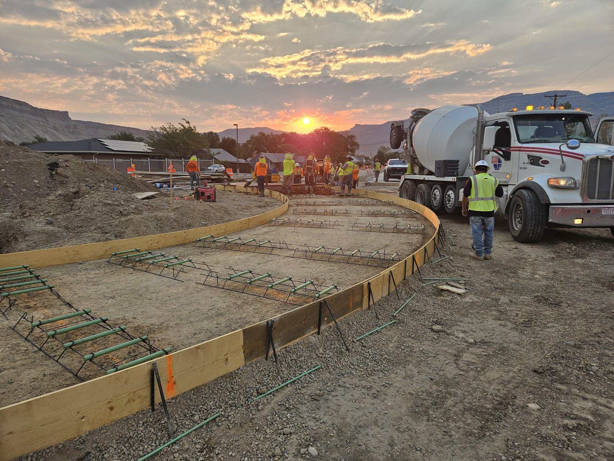US 6 Palisade Intersection Improvements - US 6 at Elberta Avenue pouring the roundabout apron looking east_August 2026.jpg detail image